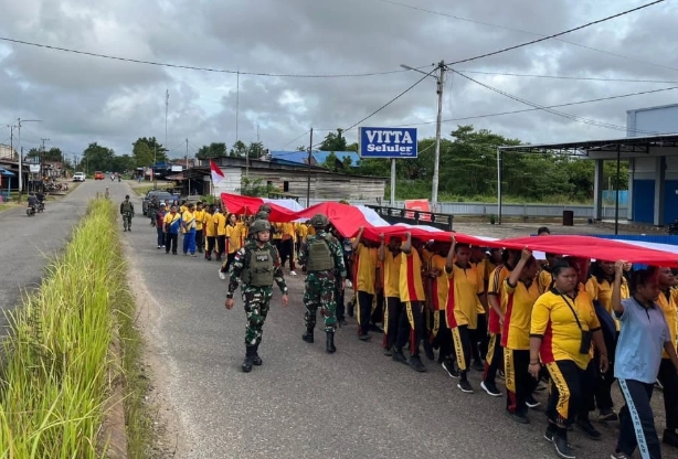 Satgas Yonif 144/JY Kibarkan Semangat Merah Putih Kepada Generasi Muda di Papua