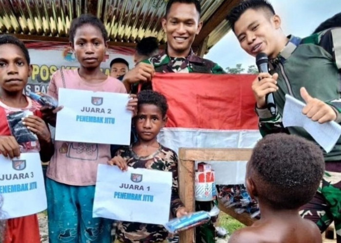 Luar Biasa Dilakukan Satgas Yonif Raider, Songsong HAN, Prajurit Lakukan Ini Bersama Anak anak Papua
