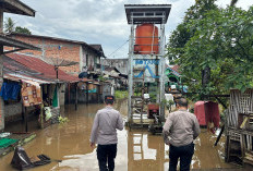 Polres Pagar Alam Sigap Tangani Banjir di Besemah Serasan