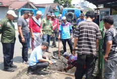Drainase Tersumbat Pemicu Badan Jalan Terendam Banjir